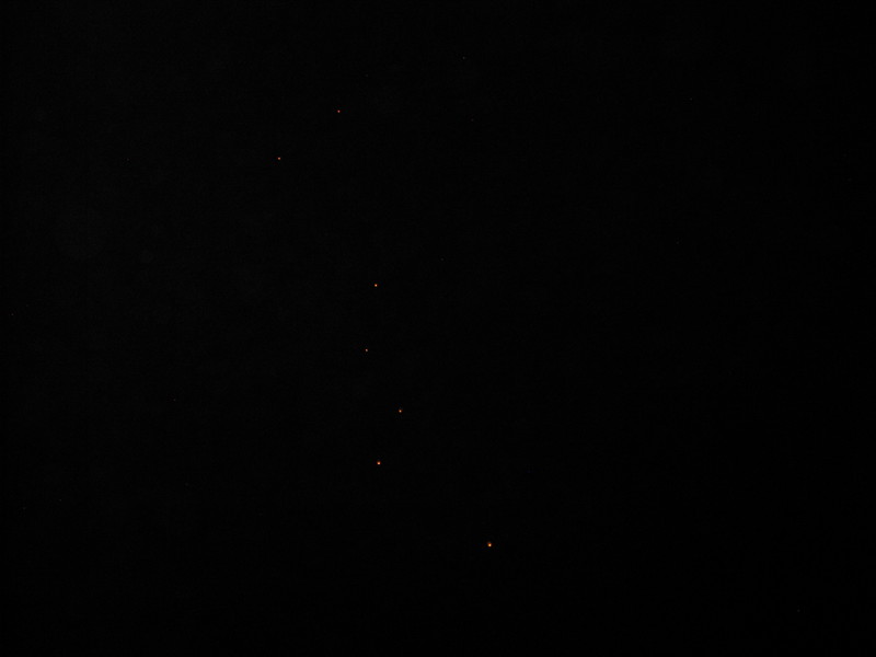 I can't see anything in this "thumb" but it's lanterns. You have to click on it to see it better. It looked like a wobbly "Cassiopeia." :-) They lit about 24 of them off in about 15 minutes. I was amazed and impressed. I'd never seen anything like it before.