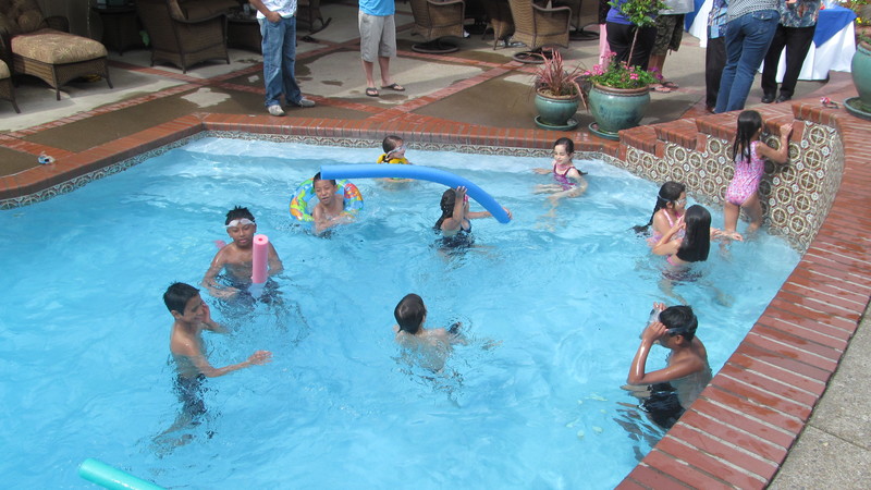 The children were enjoying the pool.