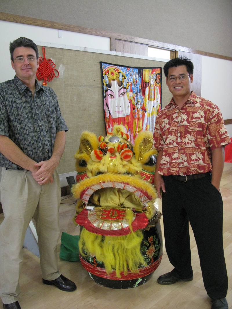Br. Nemrow and Ban Phung with the Lion