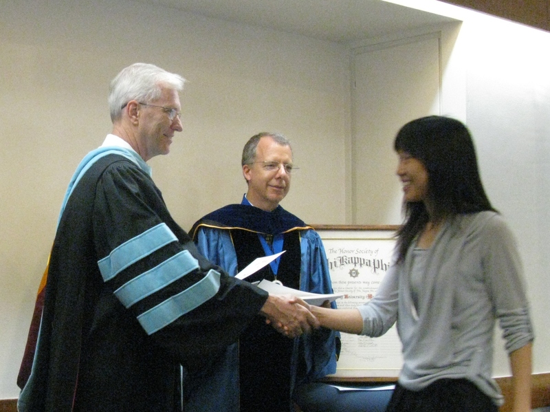 Bill Neal presents certificate to Vivian Cheng.