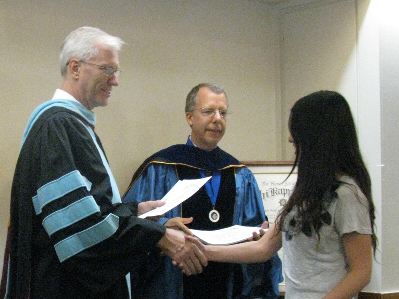 Bill Neal presents certificate to Lok In Kong.