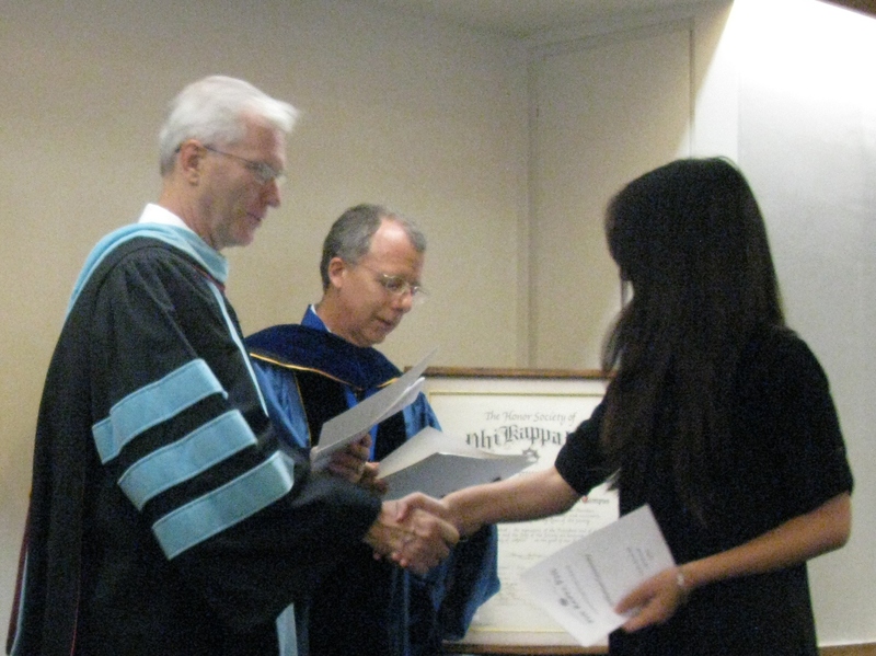 Bill Neal presents certificate to Cynthia Li.