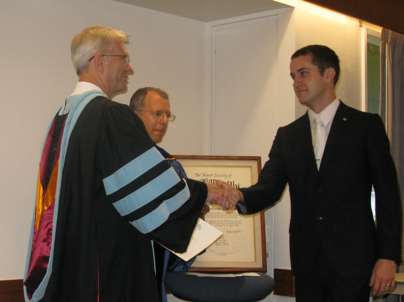 Bill Neal presents certificate to David Romney.