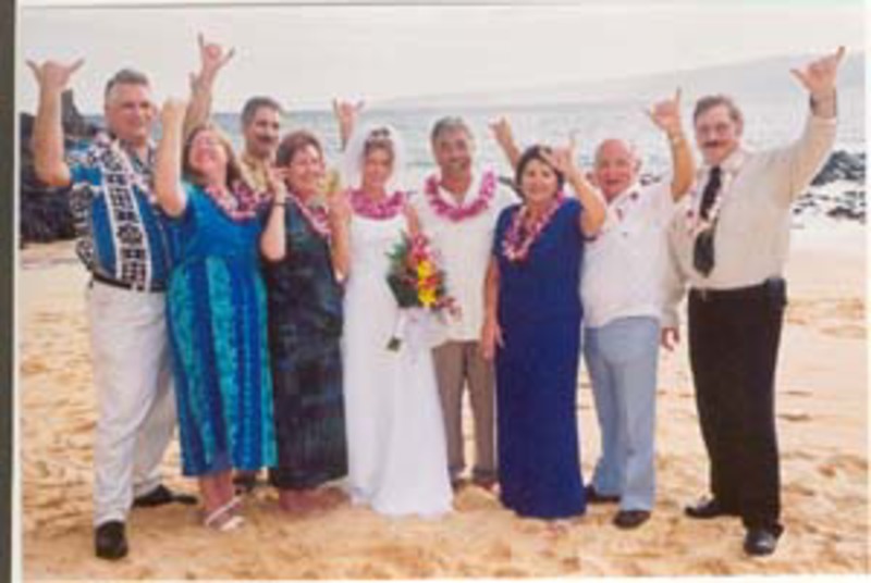 Don, Lois, Jim, Cindy, Rachel, Jim, Jim's parents, Minister, all doing Shaka
