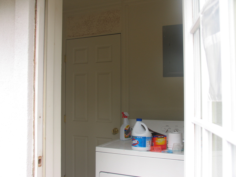 Inside the laundryroom. It has another door to inside the house.