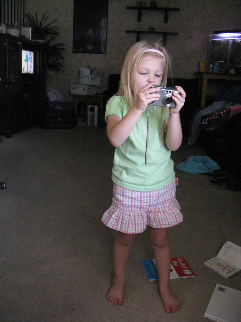 I am Woman. Hear me click. She LOVES taking pictures.