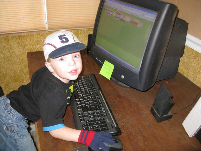 Caleb playing the computer.