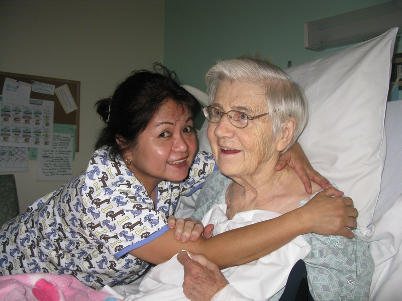 Here is mom with one of her favorite nurses. She calls her the "cute girl."