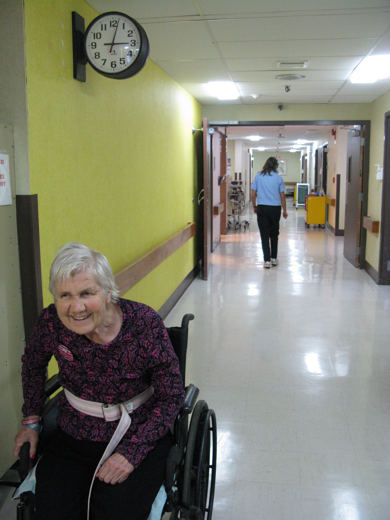 While Doris rested, the physical therapist counted to tiles to see how far she had walked.