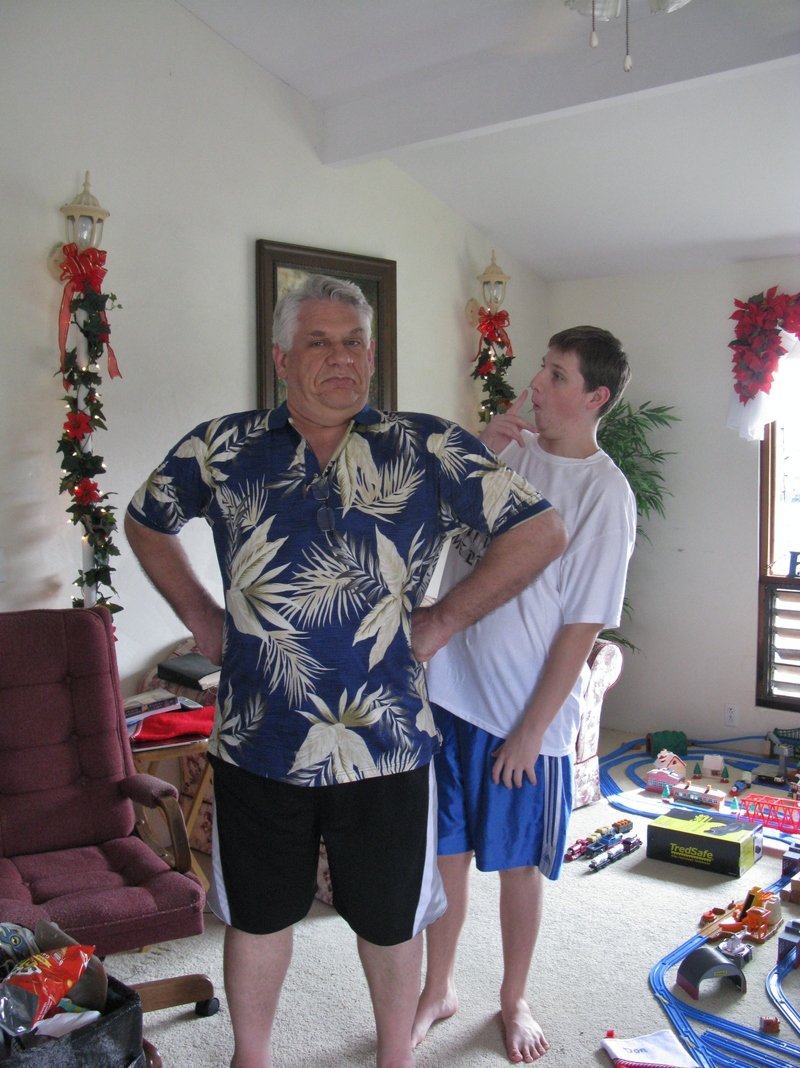 Dad got into the act of showing off the new shirts. :-)