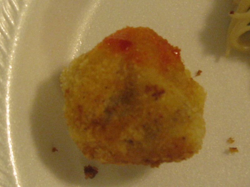 potato balls covered with .