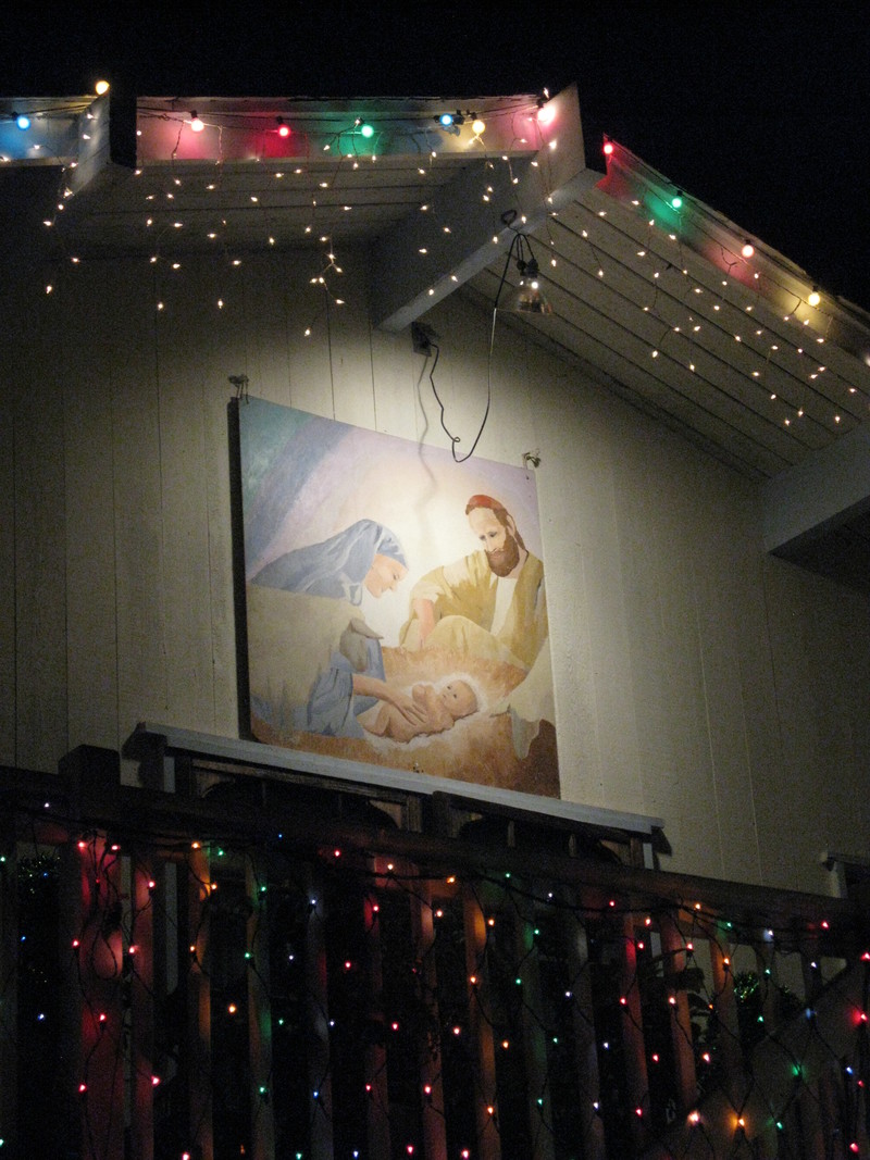 My copy of Harry Anderson's "Isaiah Writes of Christ's Birth" has hung outside our home during the month of December for 25 years.