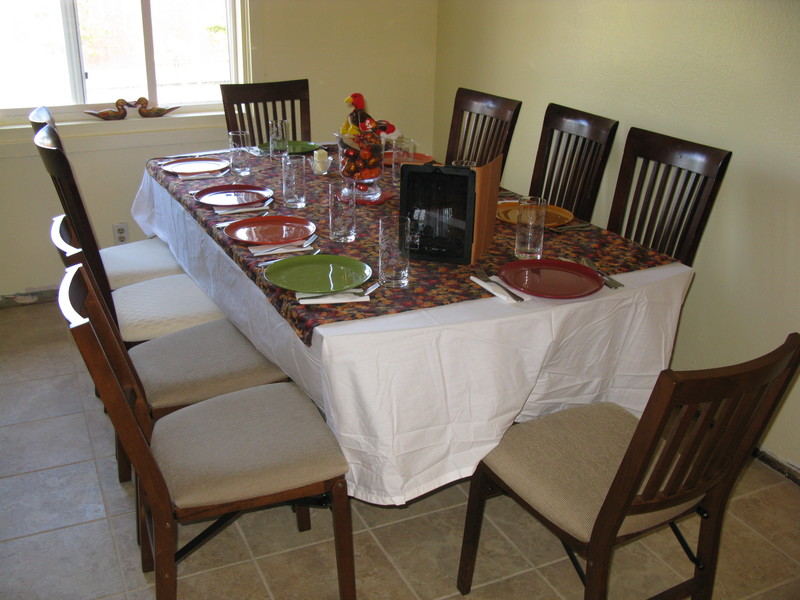 Here's the beautiful table. You'd never know that there were doors stored in the room yesterday. :-)