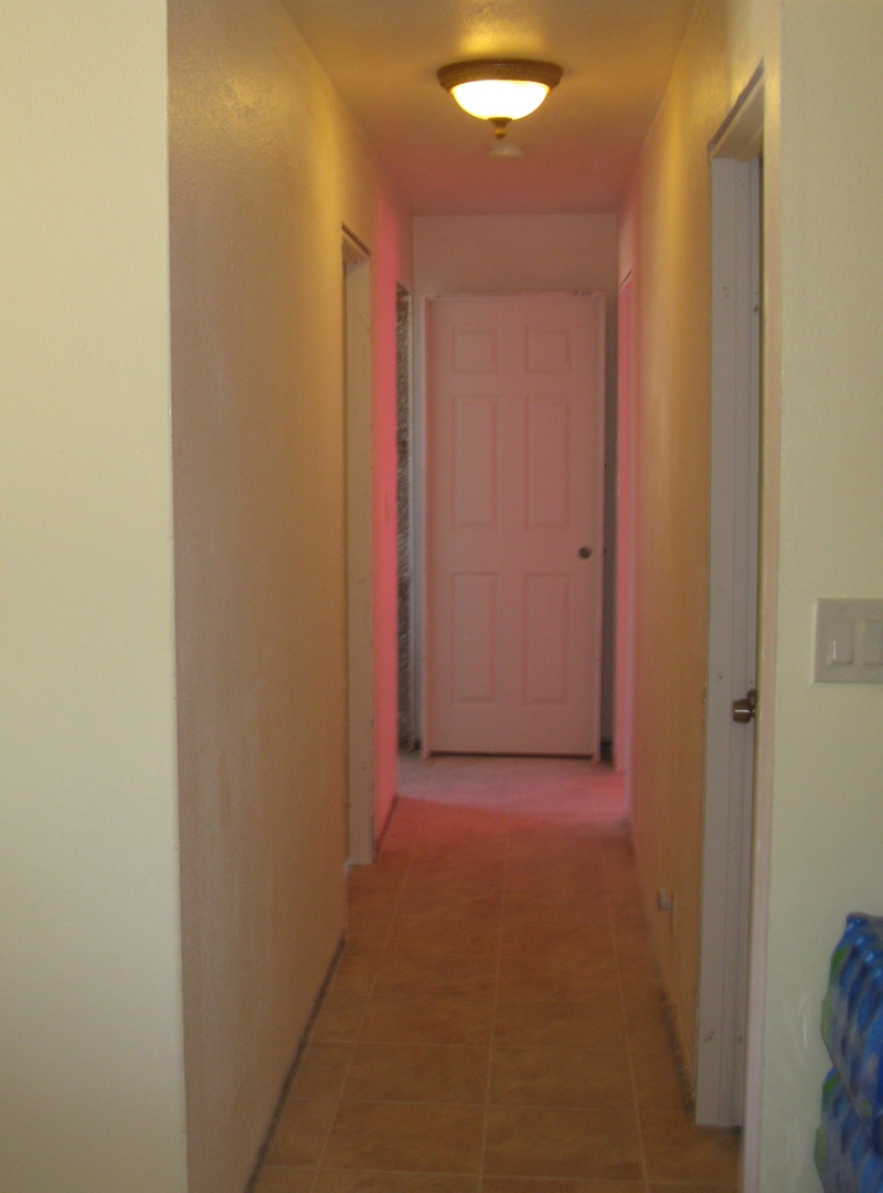 Took some pictures of Jim and Cindy's house currently. I thought it was cool that the hallway was red from a curtain hanging in their bedroom.