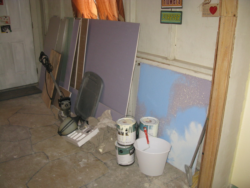 This is the livingroom/entry area wall. I think it looks like an art studio. Way cool.