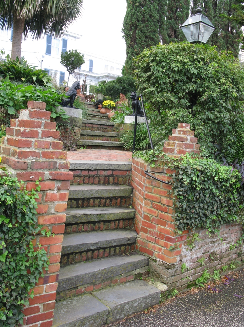 Came to these stairs and we just went into the yard. Of course, he told us about the people that lived there. This one had lots of terraces and gardens.