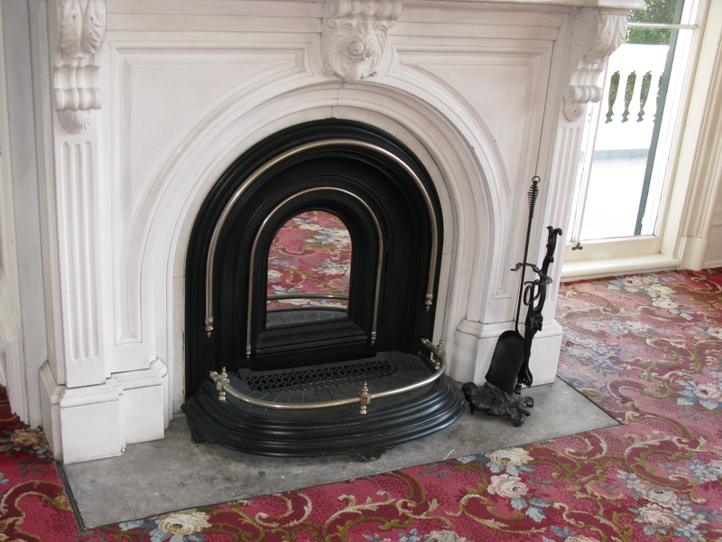 The fireplaces had mirrors on them so that they ladies could check and see what their hemlines looked like.