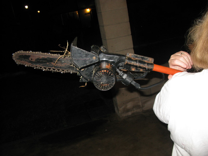 Here's the back for whatever that's worth. :-) I REALLY like this "toy" of mine. It does need some strength to hold it out at arms length, but I'm pretty strong. :-) It's light enough that I can do that.