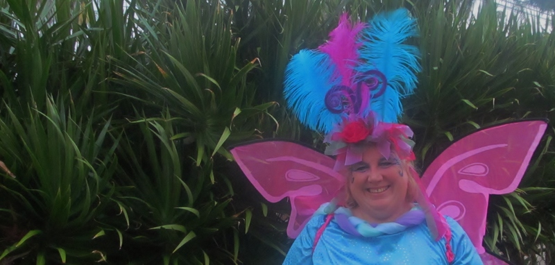 Fortunately, LeGrand, our neighbor came along and shot some pictures of me. So I've been called a butterfly, and a Vegas Show girl, and who know what else. :-) Still don't know what I am, but I like it so much more. It's definitely impressive, I think. It was fun walking down the street in it. :-)