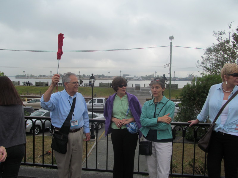 Here's our guide with his umbrella for us to follow or find him. The Mississippi is behind him.