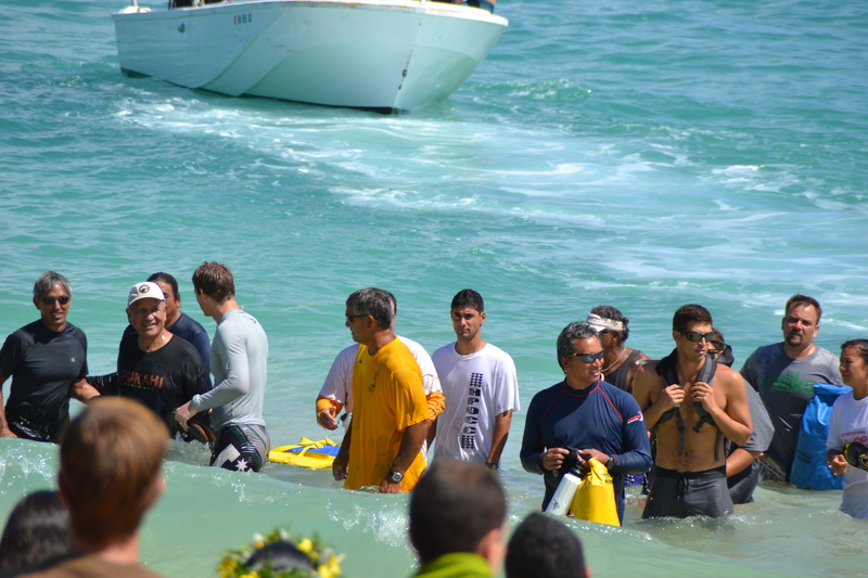 Nainoa Thompson, Captain, Harold Pukahi, supporter and long time Laie Resident, another Master Navigator, and other crew coming ashore.