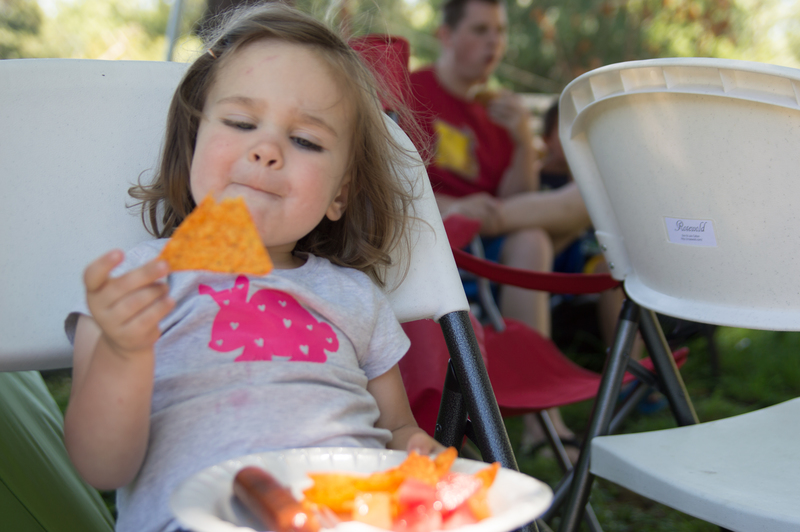 Emily Klemas contemplates a Doritos chip.