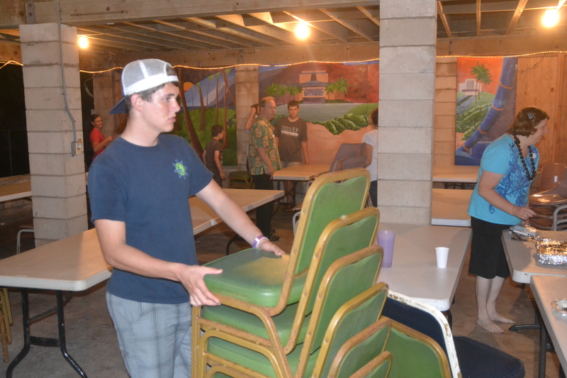 crowd, Dooley son stacking chairs, Russell Carlson, Lois Colton