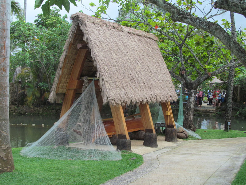 Cute fishing hut and canoe.