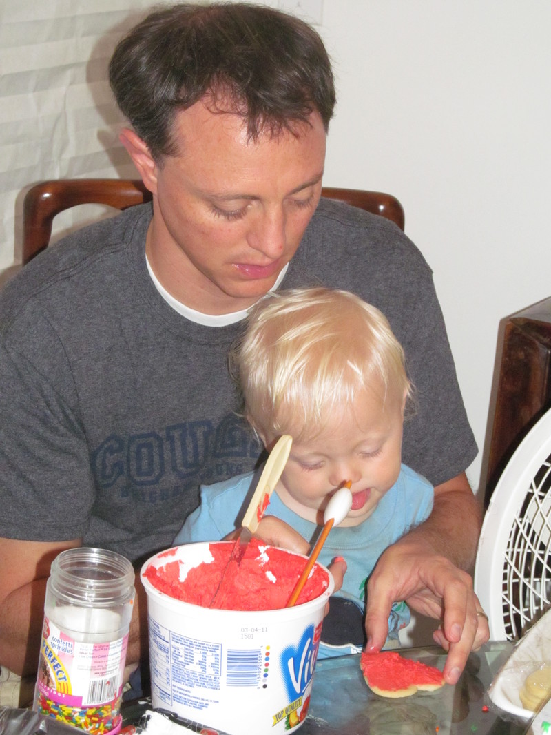 Parents working with their little ones.