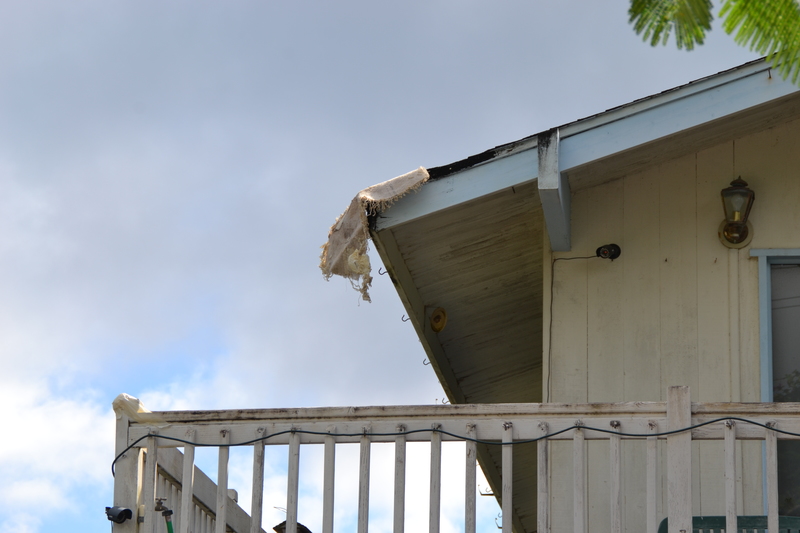 Padding the beams so they do not rip the tarps.