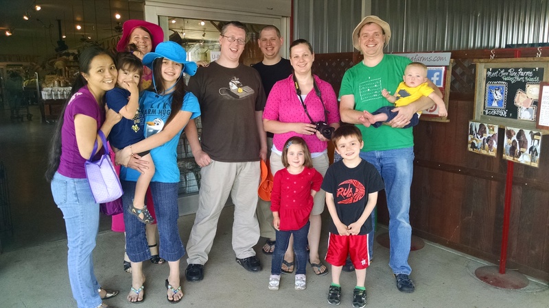 Strawberry Pickers getting ready to party. Akiko, Kekoa, Latia, Ben, Stacia, Joseph and Austin. In Front: Emily, Kili. In Back: Lois, Isaac.