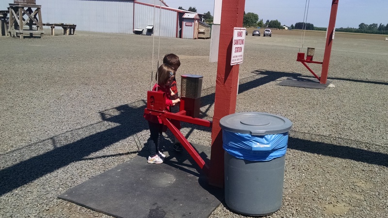 Emily and Kili getting more goat food.