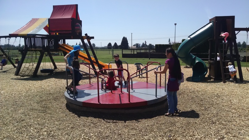 Latia, Kekoa, Emily, Kili, Akiko on Merry-Go-Round.