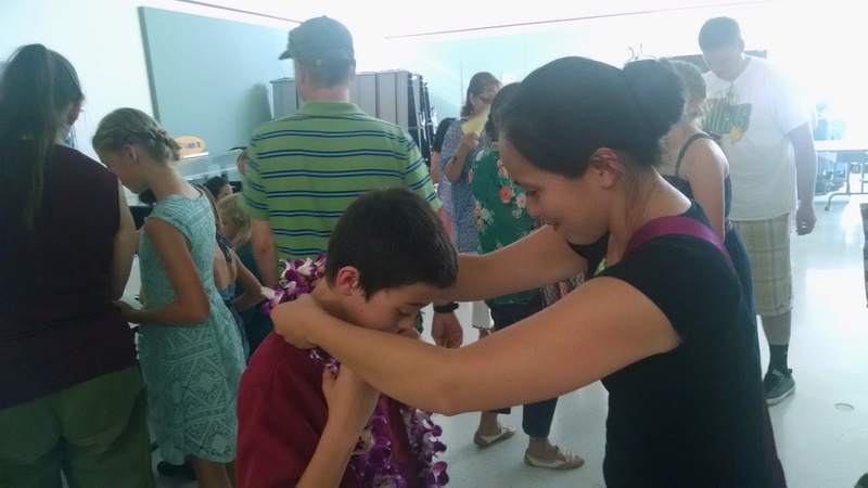 Mikey got a lei from his mom, Akiko.