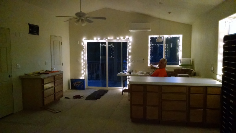 Don enjoying his hard work on installing doors.