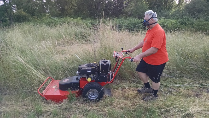 Don trying out Dr. Field's Brush Cutter.