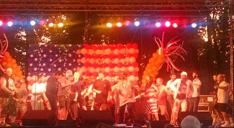 Chubby Checkers in the middle. He asked the men to come up and dance.