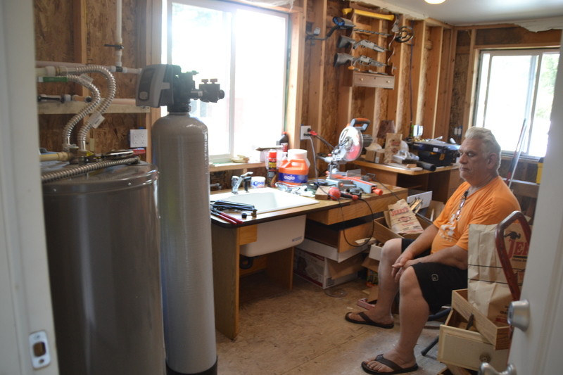 Don watching the filter installation.