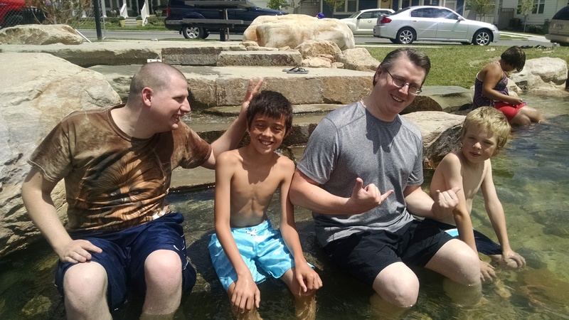 Isaac, Mikey, Ben, and Caleb chillin' on a rock.