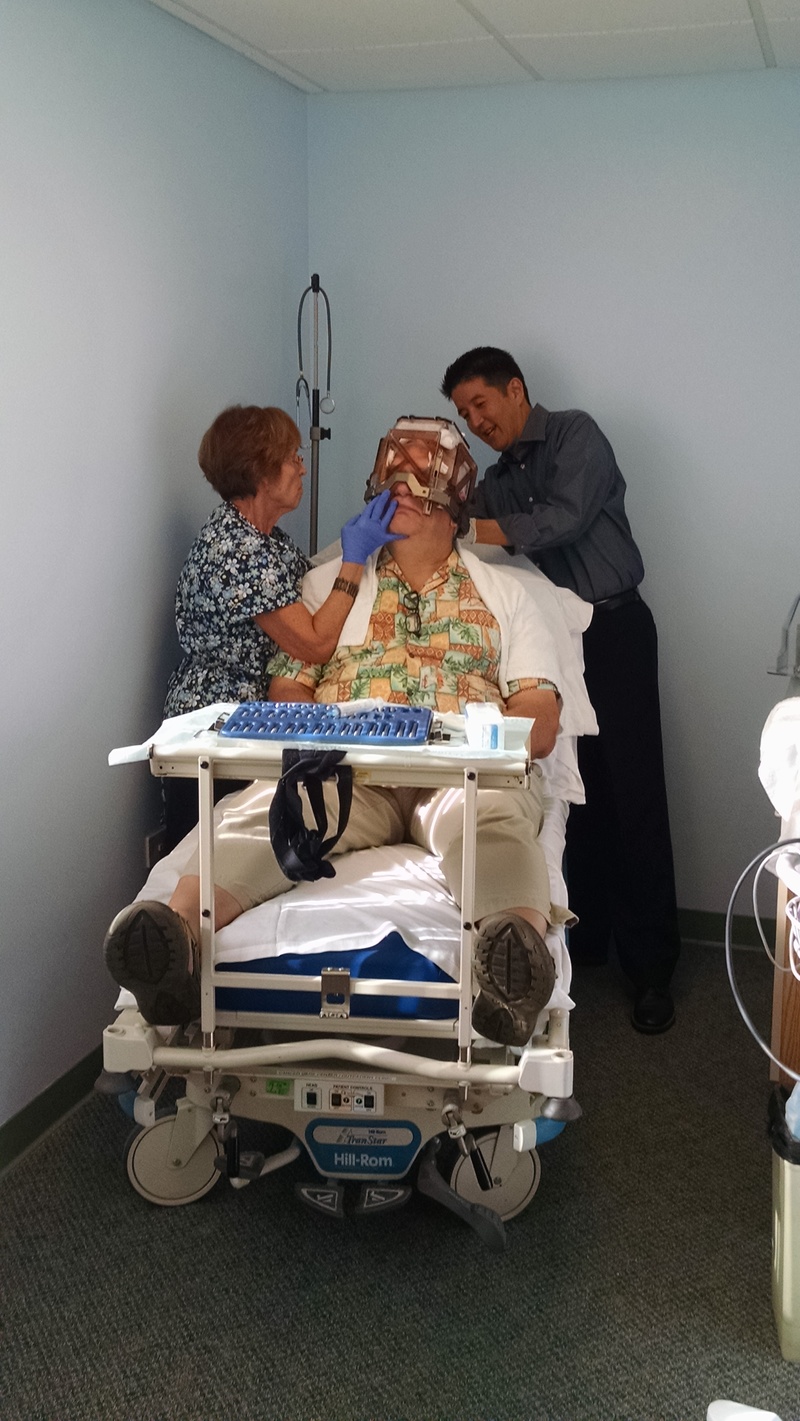 More novocaine on the back where the bolts will go in. Lois thinks the tool set in the front looks impressive. :-)