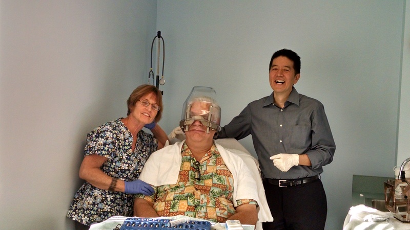 Everybody is smiling. I am even faking a smile, pretty convincingly I think.