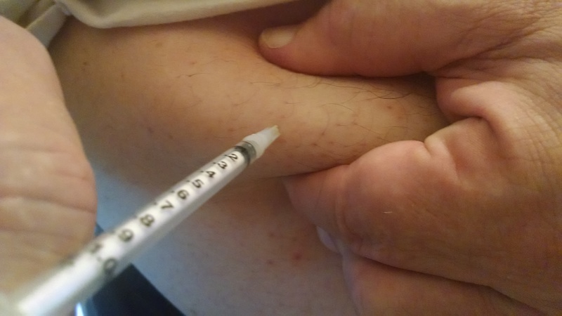 Grab the fat and poke it in so that you don't hit a muscle.