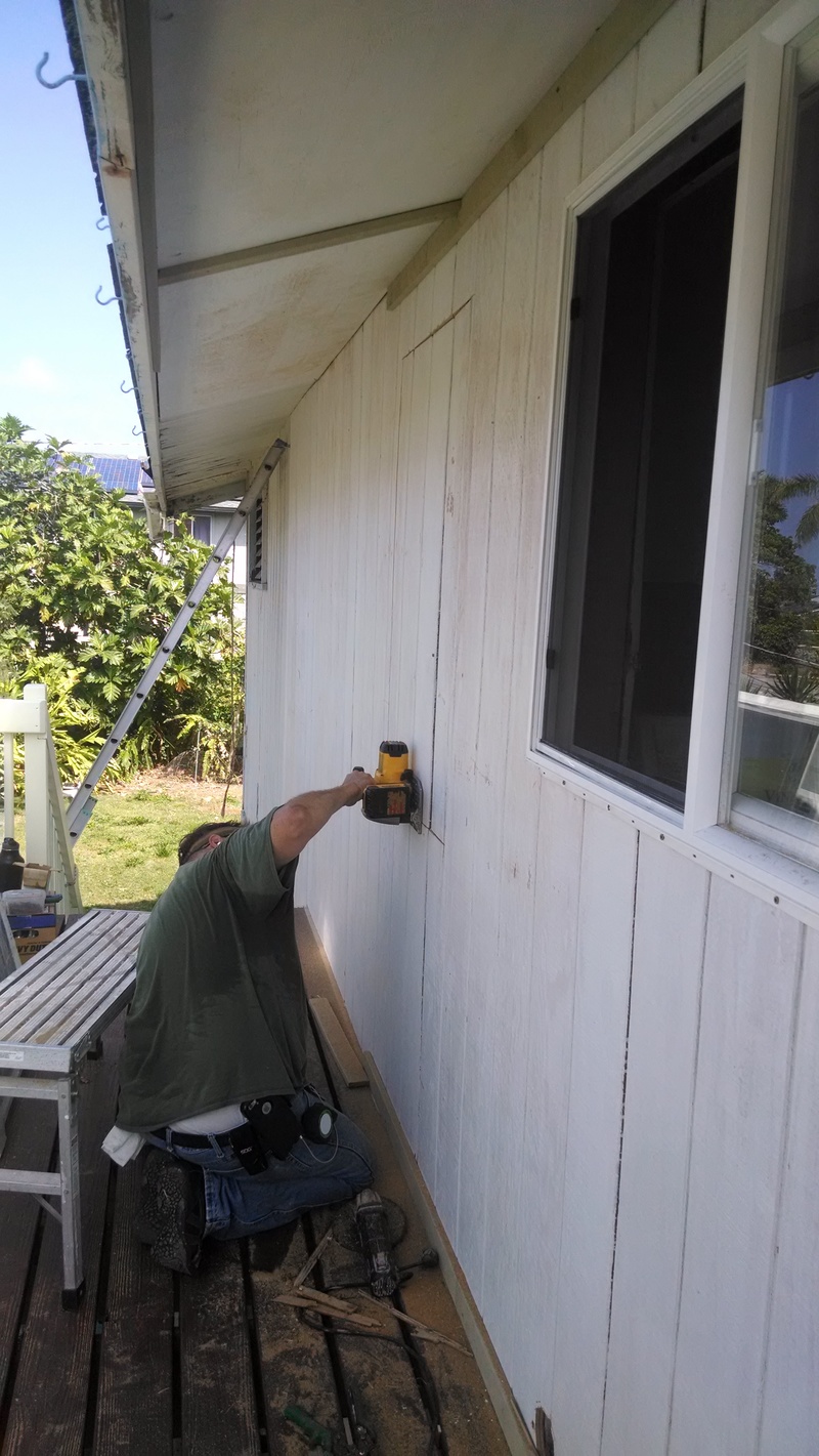 Carl cutting out Don's study window hole. You can see the new window in the main bathroom.