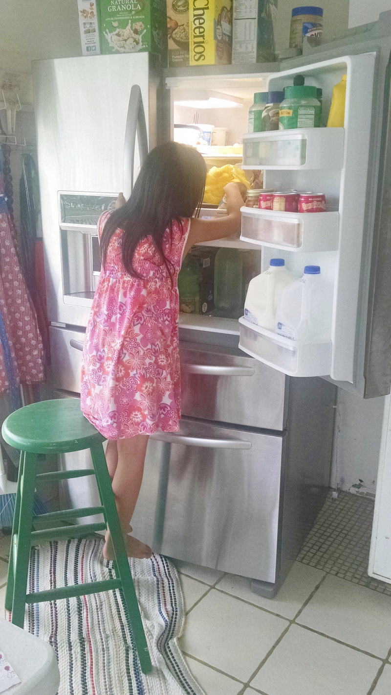 Eva wanted some yogurt. She knows how to take care of herself. :-)