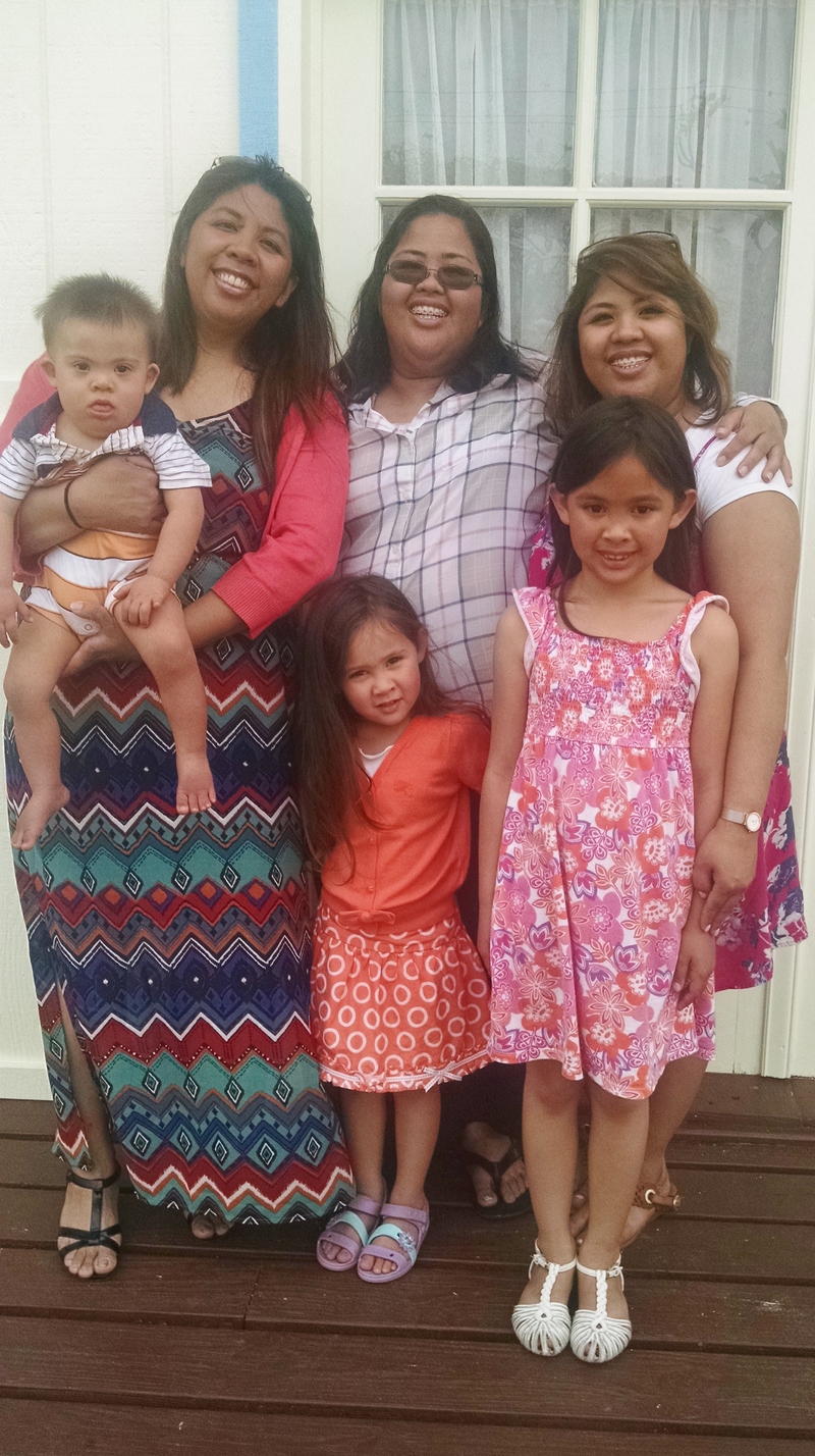 Calvin with Ann, Maria, Theresa. Adele in middle front, and Eva front right.