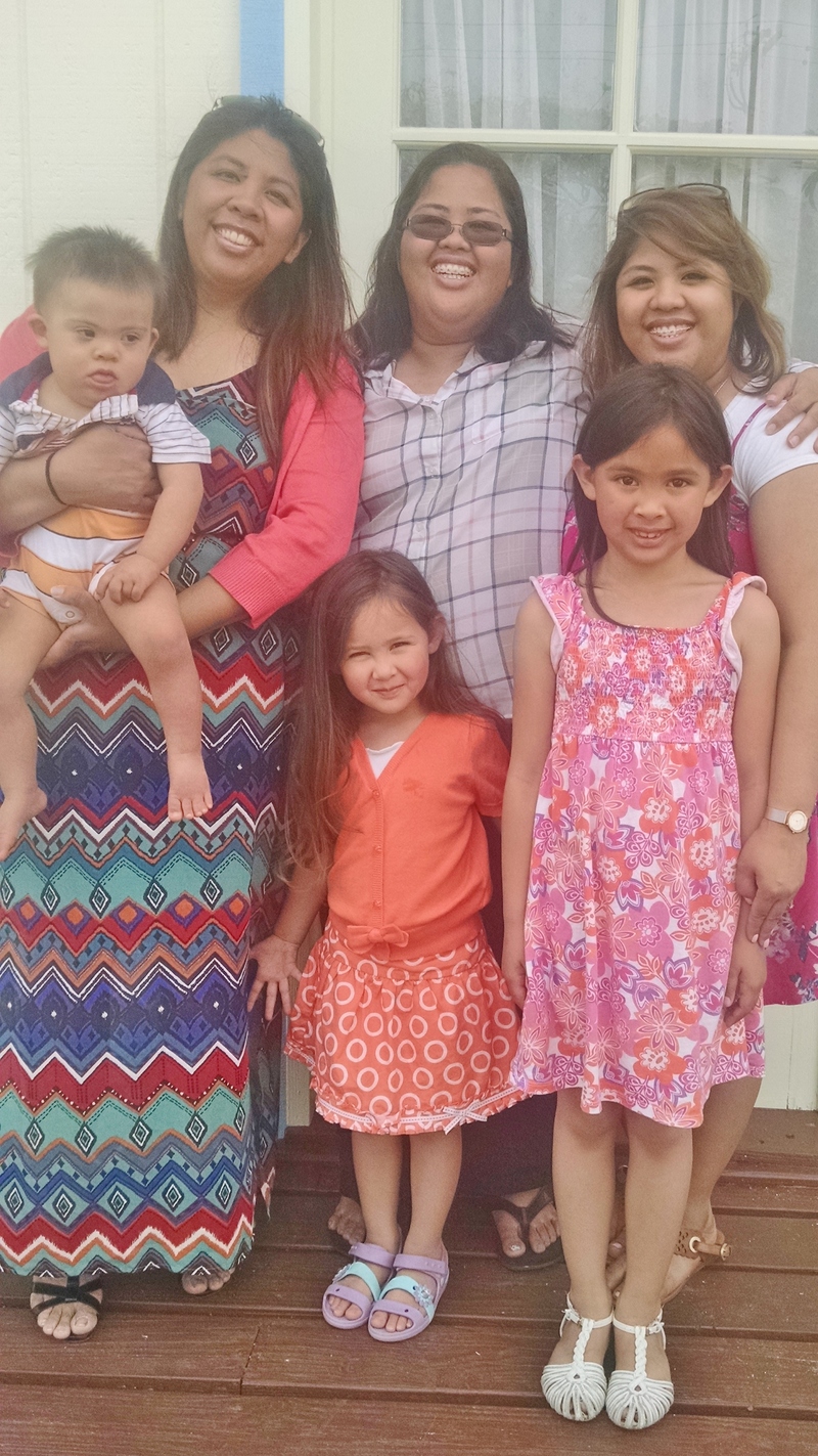 Calvin with Ann, Maria, Theresa. Adele in middle front, and Eva front right.