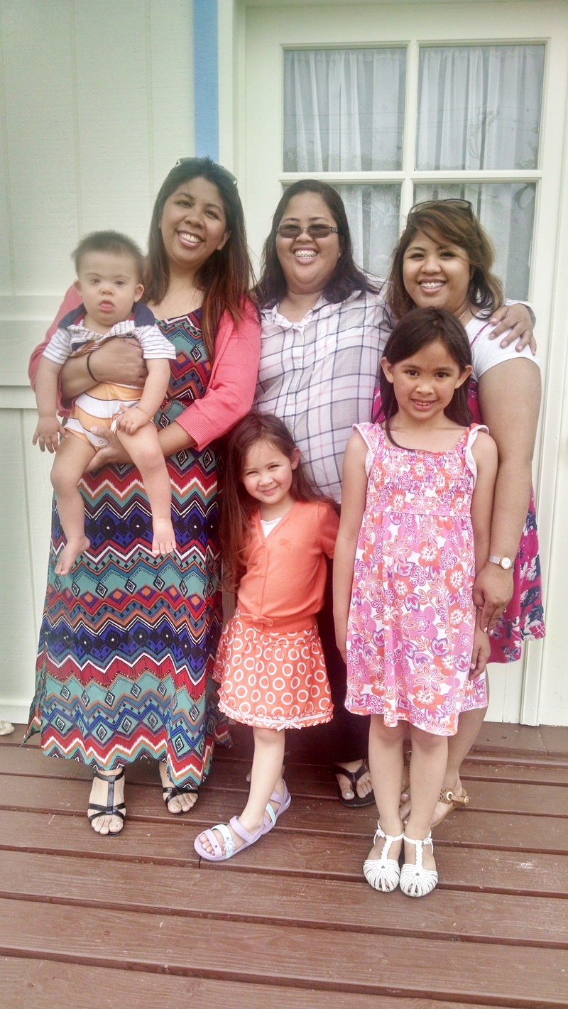 Calvin with Ann, Maria, Theresa. Adele in middle front, and Eva front right.