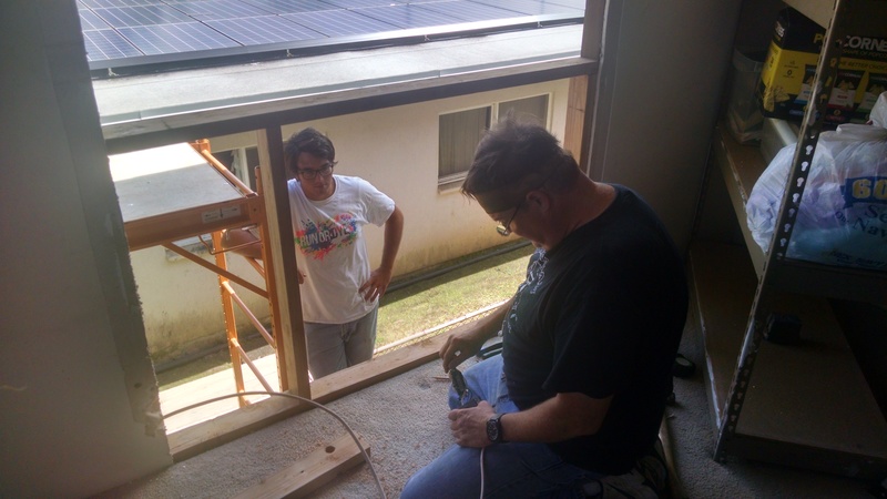 Working on the Sewing Room South Window.