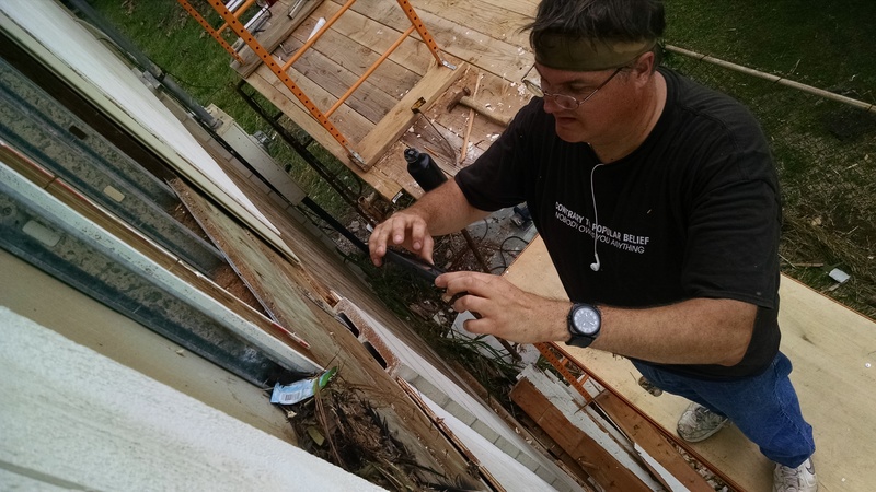 Carl removing the best thing from the house.