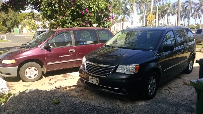 Ann and Daniel's rental van and the pile of gravel I want to have moved so vehicles can park right.